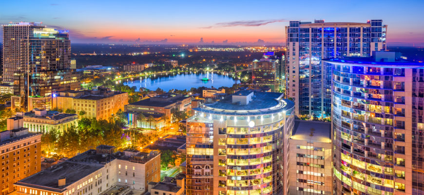 Orlando, Florida, USA aerial cityscape towards Eola Lake.